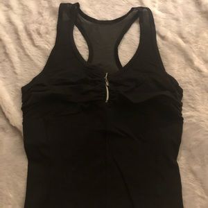 Bebe sport workout tank. Built in bra.